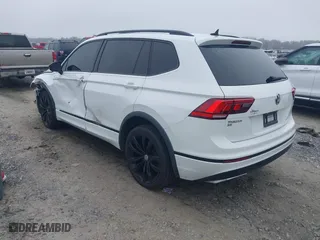 2020 Volkswagen Tiguan SE with VIN 3VV2B7AX1LM151388, listed as a IAAI auction lot 41480146 with 154,567 mi miles. Bid and sale history available at carsss.com. Image 3.