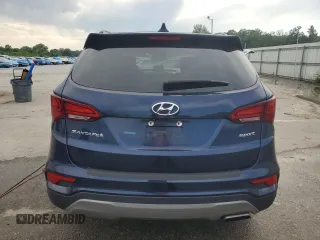 2018 Hyundai Santa Fe 2.4L z VIN 5XYZU3LB2JG537457, wystawiony jako Copart lot #56800005 z przebiegiem 97 344 mil mil oraz Szkoda całkowita • Salvage title. Historia ofert i sprzedaży dostępna na DreamBid. Obrazek 6.