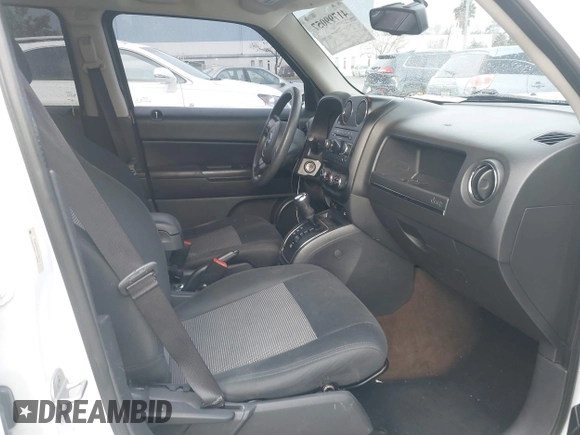 2014 Jeep Patriot Sport with VIN 1C4NJRBB3ED509117, listed as a IAAI auction lot 41799057 with 161,663 mi miles. Bid and sale history available at carsss.com. Image 5.