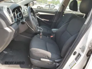 2009 Toyota Matrix S z VIN 2T1KE40E69C005557, wystawiony jako Copart lot #58575935 z przebiegiem 131 990 mil mil oraz Szkoda całkowita • Salvage title. Historia ofert i sprzedaży dostępna na DreamBid. Obrazek 7.