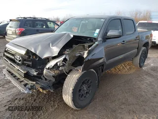 2016 Toyota Tacoma SR5 with VIN 5TFAX5GN1GX056450, listed as a IAAI auction lot 41215339 with 129,604 mi miles. Bid and sale history available at carsss.com. Image 2.