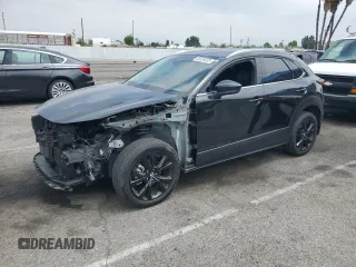 2023 Mazda CX-30 Premium with VIN 3MVDMBDY0PM527107, listed as a Copart auction lot 55529325 with 17,088 mi miles and Salvage title. Bid and sale history available at DreamBid. Image 1.