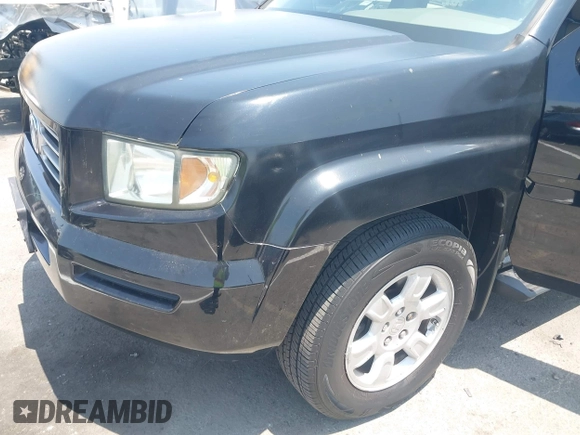 2006 Honda Ridgeline RTL with VIN 2HJYK16576H566002, listed as a IAAI auction lot 42595698 with 212,637 mi miles and . Bid and sale history available at DreamBid. Image 6.