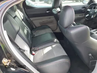 2006 Dodge Charger SRT-8 with VIN 2B3LA73W96H371246, listed as a IAAI auction lot 41676168 with 130,064 mi miles and . Bid and sale history available at carsss.com. Image 8.