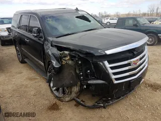 2015 Cadillac Escalade Luxury with VIN 1GYS4MKJ4FR665766, listed as a Copart auction lot 59316120 with 124,439 mi miles and Salvage Title. Bid and sale history available at carsss.com. Image 1.