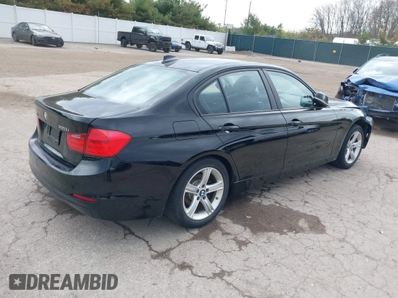 2014 BMW 3 Series 320i xDrive with VIN WBA3C3C51EF983320, listed as a IAAI auction lot 42091122 with 12,312 mi miles and . Bid and sale history available at DreamBid. Image 4.