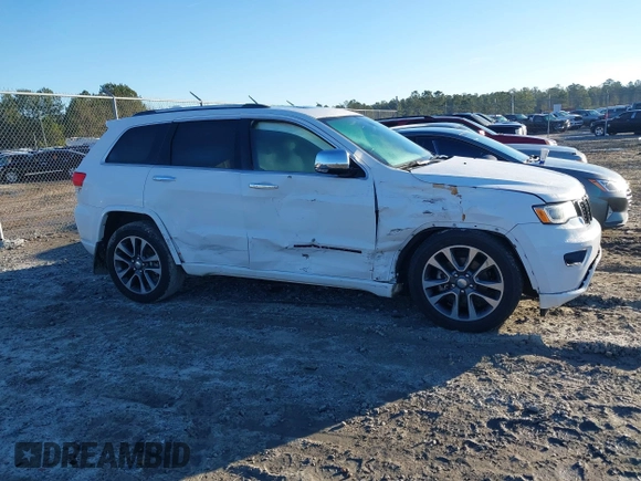 2017 Jeep Grand Cherokee Overland with VIN 1C4RJFCG8HC641729, listed as a IAAI auction lot 41233125 with 116,874 mi miles. Bid and sale history available at carsss.com. Image 13.