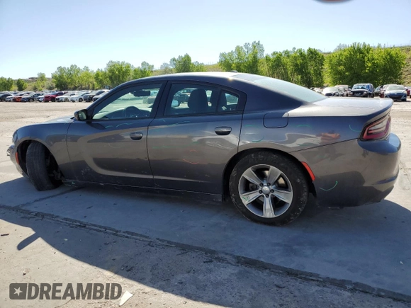 2015 Dodge Charger SXT with VIN 2C3CDXHG9FH856319, listed as a Copart auction lot 57251335 with 171,454 mi miles and Salvage title. Bid and sale history available at DreamBid. Image 2.