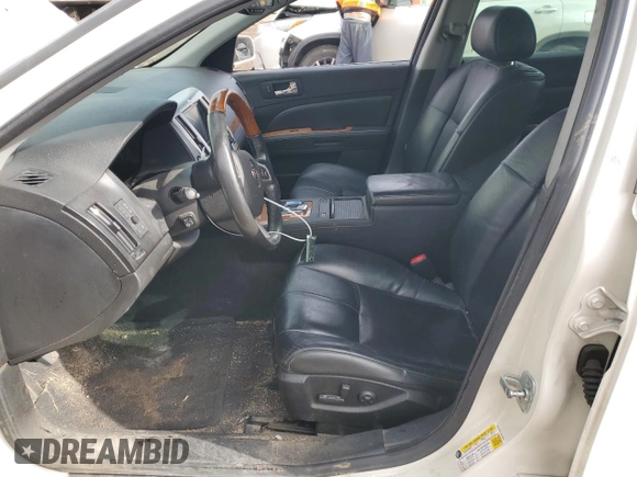 2010 Cadillac STS AWD z VIN 1G6DU6EV1A0150801, wystawiony jako Copart lot #42761515 z przebiegiem 154 865 mil mil oraz Szkoda całkowita • Salvage title. Historia ofert i sprzedaży dostępna na DreamBid. Obrazek 7.