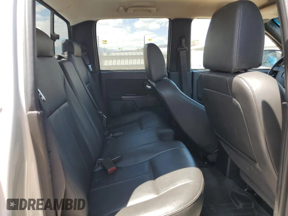 2012 GMC Canyon SLT z VIN 1GTH6NFE7C8115301, wystawiony jako Copart lot #58160785 z przebiegiem 154 682 mil mil oraz Szkoda całkowita • Salvage title. Historia ofert i sprzedaży dostępna na DreamBid. Obrazek 10.