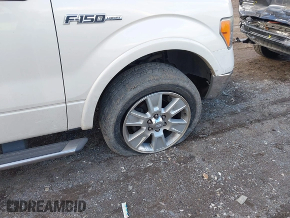 2009 Ford F-150 XL with VIN 1FTPW14V79FA62319, listed as a IAAI auction lot 41410669 with 153,044 mi miles. Bid and sale history available at carsss.com. Image 6.