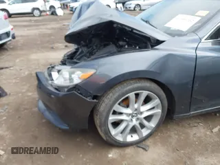 2016 Mazda 6 i Touring with VIN JM1GJ1V51G1433644, listed as a IAAI auction lot 42066262 with 95,546 mi miles and . Bid and sale history available at carsss.com. Image 6.