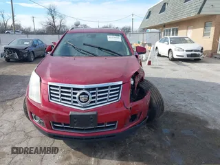 2013 Cadillac SRX Performance Collection with VIN 3GYFNDE3XDS540695, listed as a IAAI auction lot 41278568 with 137,024 mi miles and . Bid and sale history available at DreamBid. Image 12.
