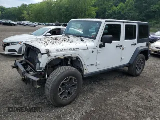 2014 Jeep Wrangler Unlimited Rubicon with VIN 1C4HJWFG4EL114743, listed as a Copart auction lot 61397575 with 110,222 mi miles and Salvage title. Bid and sale history available at DreamBid. Image 1.
