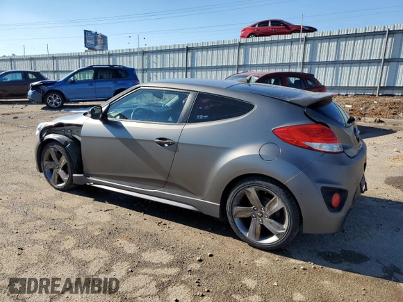 2014 Hyundai Veloster Turbo with VIN KMHTC6AE2EU210063, listed as a Copart auction lot 79243924 with 130,551 mi miles and Salvage Title. Bid and sale history available at carsss.com. Image 2.
