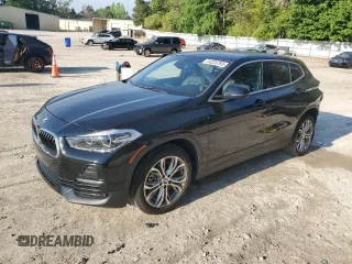 2022 BMW X2 sDrive28i z VIN WBXYH9C02N5U43355, wystawiony jako Copart lot #54235765 z przebiegiem 51 347 mil mil oraz Szkody całkowita. Historia ofert i sprzedaży dostępna na DreamBid. Obrazek 1.