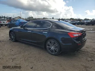 2015 Maserati Ghibli with VIN ZAM57XSA2F1129792, listed as a Copart auction lot 70717393 with 116,851 mi miles. Bid and sale history available at carsss.com. Image 2.