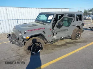2020 Jeep Wrangler Unlimited Rubicon with VIN 1C4HJXFN4LW136516, listed as a IAAI auction lot 41874403 with 87,576 mi miles. Bid and sale history available at carsss.com. Image 17.