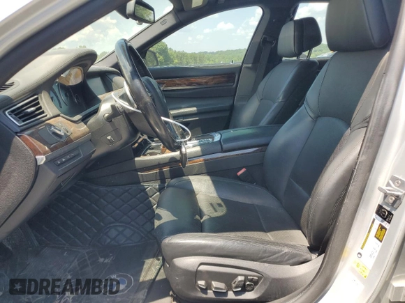 2013 BMW 7 Series 750i with VIN WBAYA8C58DC996865, listed as a Copart auction lot 61831294 with 151,238 mi miles and Salvage Title. Bid and sale history available at DreamBid. Image 7.