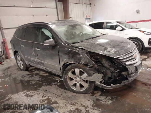 2015 Chevrolet Traverse LTZ with VIN 1GNKVJKD8FJ360899, listed as a IAAI auction lot 41634924 with 165,835 mi miles and . Bid and sale history available at DreamBid. Image 1.