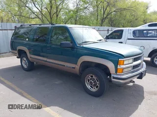 1995 Chevrolet Suburban with VIN 1GNGK26N9SJ397588, listed as a IAAI auction lot 42114009 with 238,914 mi miles. Bid and sale history available at carsss.com. Image 1.