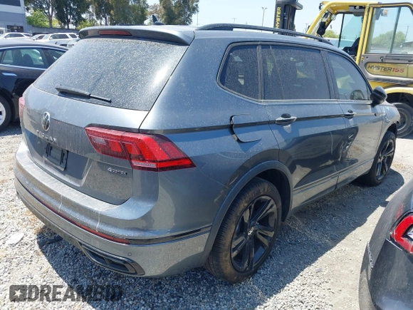 2023 Volkswagen Tiguan SE R-Line Black with VIN 3VV8B7AX3PM018096, listed as a IAAI auction lot 42174933 with 25,742 mi miles and . Bid and sale history available at DreamBid. Image 4.