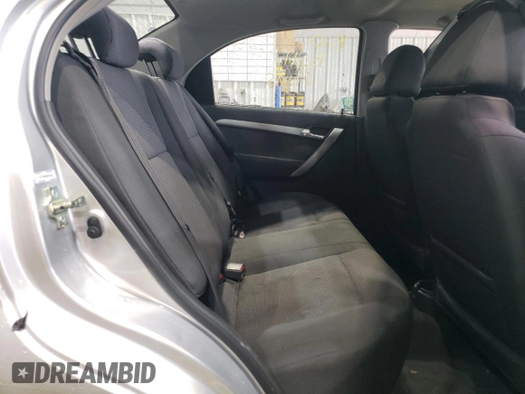 2011 Chevrolet Aveo 1LT z VIN KL1TD5DE6BB154327, wystawiony jako Copart lot #51313085 z przebiegiem 76 402 mil mil oraz Szkoda całkowita • Salvage title. Historia ofert i sprzedaży dostępna na DreamBid. Obrazek 10.