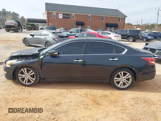 2014 Nissan Altima SL with VIN 1N4BL3AP7EC408083, listed as a IAAI auction lot 40978013 with 108,381 mi miles and . Bid and sale history available at DreamBid. Image 14.