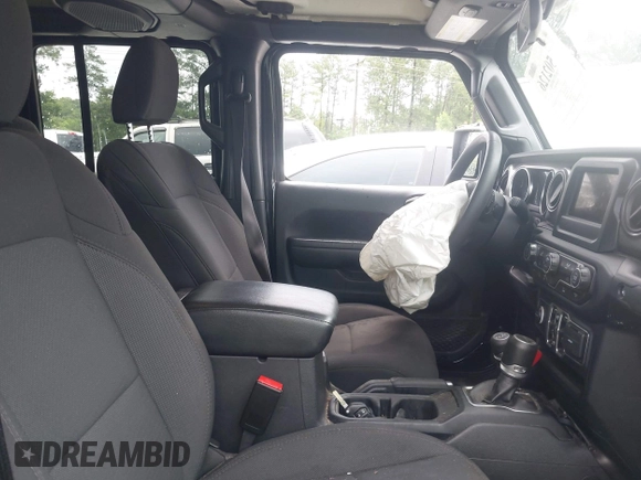 2023 Jeep Gladiator Sport S z VIN 1C6HJTAG3PL521954, wystawiony jako IAAI lot #42502126 z przebiegiem 49 606 mil mil oraz . Historia ofert i sprzedaży dostępna na DreamBid. Obrazek 5.