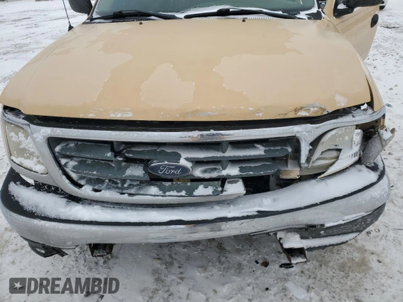 2002 Ford F-150 XL with VIN 1FTRF17202KD31428, listed as a Copart auction lot 45582885 with 218,548 mi miles and Salvage title. Bid and sale history available at DreamBid. Image 11.