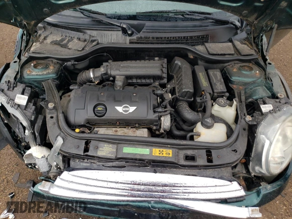 2009 MINI Hardtop z VIN WMWMF33509TW77714, wystawiony jako Copart lot #50618025 z przebiegiem 86 673 mil mil oraz Szkoda całkowita • Salvage title. Historia ofert i sprzedaży dostępna na DreamBid. Obrazek 11.