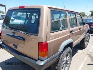 1999 Jeep Cherokee SE with VIN 1J4FF28S4XL592788, listed as a IAAI auction lot 42560002 with 189,258 mi miles and . Bid and sale history available at DreamBid. Image 4.