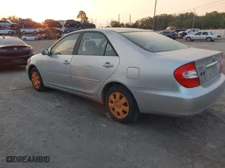 2002 Toyota Camry LE with VIN 4T1BE32K42U011553, listed as a IAAI auction lot 42054226 with 223,683 mi miles. Bid and sale history available at carsss.com. Image 3.