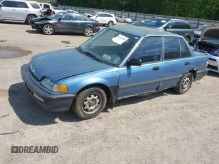 1991 Honda Civic z VIN 1HGED3649ML019481, wystawiony jako IAAI lot #42143741 z przebiegiem 352 104 mil mil oraz . Historia ofert i sprzedaży dostępna na DreamBid. Obrazek 2.