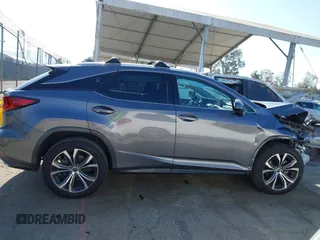 2020 Lexus RX 350 z VIN 2T2HZMAA3LC153162, wystawiony jako IAAI lot #42292460 z przebiegiem 112 913 mil mil oraz . Historia ofert i sprzedaży dostępna na DreamBid. Obrazek 13.