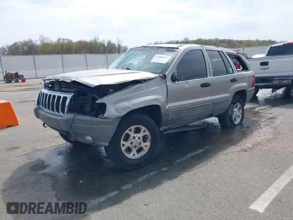 2000 Jeep Grand Cherokee Laredo with VIN 1J4GW48N5YC322707, listed as a IAAI auction lot 42080677 with Not provided miles and . Bid and sale history available at DreamBid. Image 2.