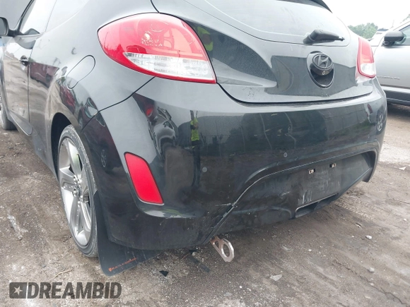 2013 Hyundai Veloster w/Black Int with VIN KMHTC6AD7DU170049, listed as a IAAI auction lot 42441737 with 101,924 mi miles and . Bid and sale history available at DreamBid. Image 6.