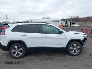 2022 Jeep Cherokee Limited with VIN 1C4PJMDX6ND550698, listed as a IAAI auction lot 41238598 with 18,006 mi miles and . Bid and sale history available at DreamBid. Image 13.