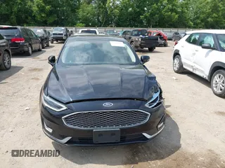 2019 Ford Fusion Titanium z VIN 3FA6P0RU0KR260239, wystawiony jako IAAI lot #42436643 z przebiegiem 114 631 mil mil oraz . Historia ofert i sprzedaży dostępna na DreamBid. Obrazek 12.