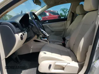 2010 Volkswagen Jetta Limited Edition z VIN 3VWAX7AJ2AM106655, wystawiony jako Copart lot #57489395 z przebiegiem 110 482 mil mil oraz Szkoda całkowita • Salvage title. Historia ofert i sprzedaży dostępna na DreamBid. Obrazek 7.