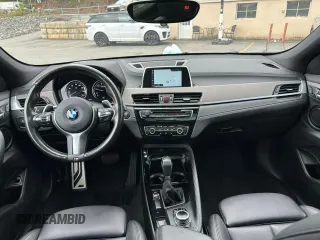 2018 BMW X2 sDrive28i z VIN WBXYJ3C32JEJ75882, wystawiony jako Copart lot #56330835 z przebiegiem 84 609 mil mil oraz Tytuł czysty. Historia ofert i sprzedaży dostępna na DreamBid. Obrazek 8.