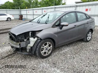 2014 Ford Fiesta SE z VIN 3FADP4BJ2EM203718, wystawiony jako Copart lot #58165675 z przebiegiem 60 429 mil mil oraz Szkoda całkowita • Salvage title. Historia ofert i sprzedaży dostępna na DreamBid. Obrazek 1.