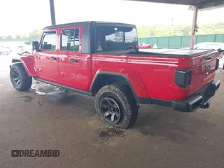 2021 Jeep Gladiator Willys z VIN 1C6HJTAG7ML602130, wystawiony jako IAAI lot #42161745 z przebiegiem 49 576 mil mil oraz . Historia ofert i sprzedaży dostępna na DreamBid. Obrazek 3.
