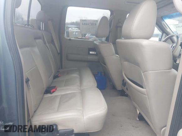 2005 Ford F-150 XLT with VIN 1FTPW14565KE80310, listed as a IAAI auction lot 41874484 with 173,315 mi miles. Bid and sale history available at carsss.com. Image 8.