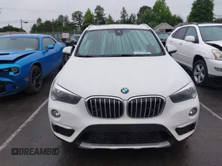 2019 BMW X1 xDrive28i with VIN WBXHT3C54K3H35641, listed as a IAAI auction lot 42241894 with 100,989 mi miles and . Bid and sale history available at DreamBid. Image 12.