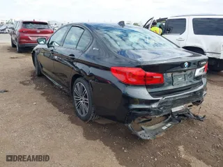 2019 BMW 5 Series 530e iPerformance with VIN WBAJA9C59KB389304, listed as a IAAI auction lot 41562928 with 64,137 mi miles. Bid and sale history available at carsss.com. Image 3.
