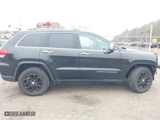 2016 Jeep Grand Cherokee Limited 75th Anniversary with VIN 1C4RJFBG9GC392048, listed as a IAAI auction lot 41897595 with 114,675 mi miles. Bid and sale history available at carsss.com. Image 13.