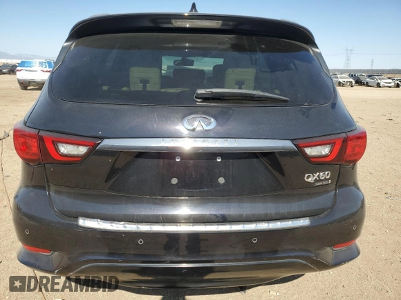 2019 Infiniti QX60 Pure with VIN 5N1DL0MN9KC566394, listed as a Copart auction lot 62879095 with 56,448 mi miles and Salvage title. Bid and sale history available at DreamBid. Image 6.