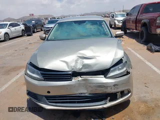 2014 Volkswagen Jetta SE with VIN 3VWD17AJ2EM314622, listed as a IAAI auction lot 42358394 with 105,654 mi miles and . Bid and sale history available at DreamBid. Image 12.