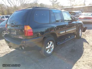 2005 GMC Envoy SLE with VIN 1GKDS13S152246568, listed as a IAAI auction lot 41293887 with 315,882 mi miles. Bid and sale history available at carsss.com. Image 4.